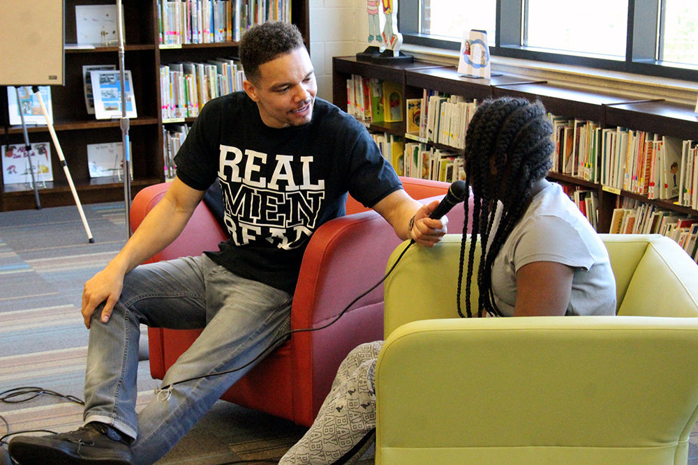 youth mentor addressing middle school students